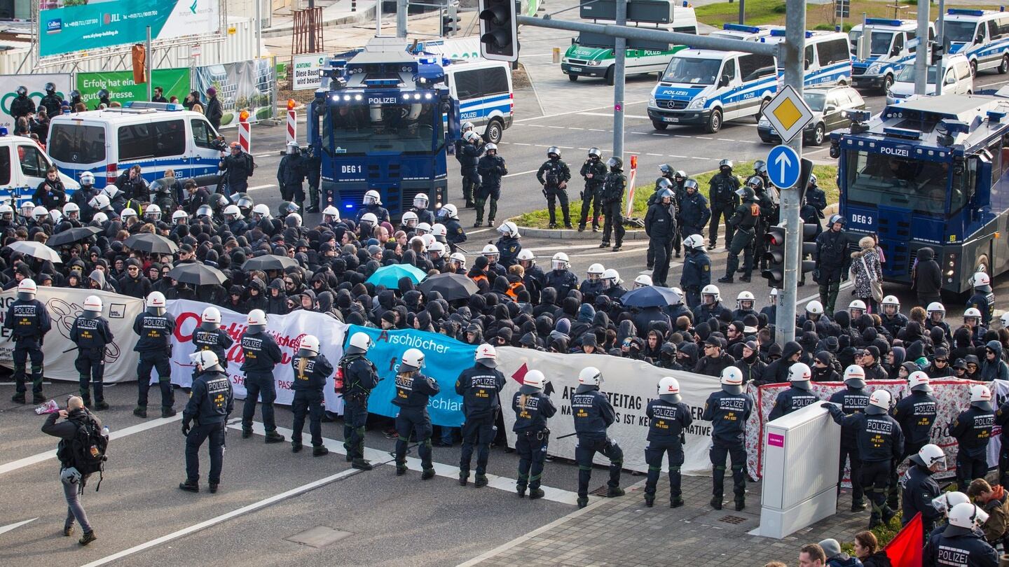 German police surround protesters who tried to block off access to the exhibition center where the Alternaitve for Germany (AfD) is holding its party convention, in Stuttgart, on Saturday. Photograph: EPA