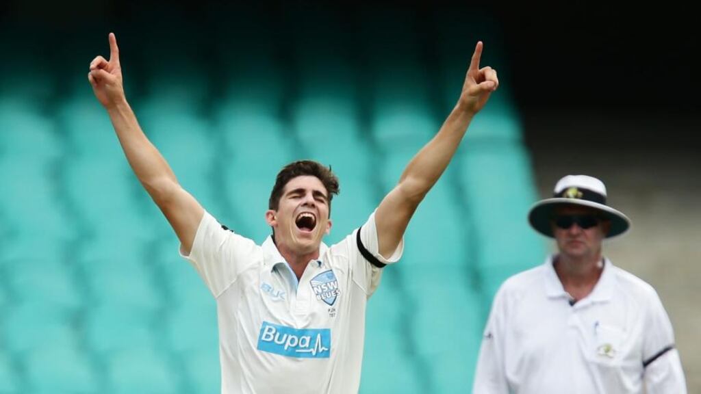 Sean Abbott  celebrates taking the wicket of Nathan Reardon on his return to action for New South Wales