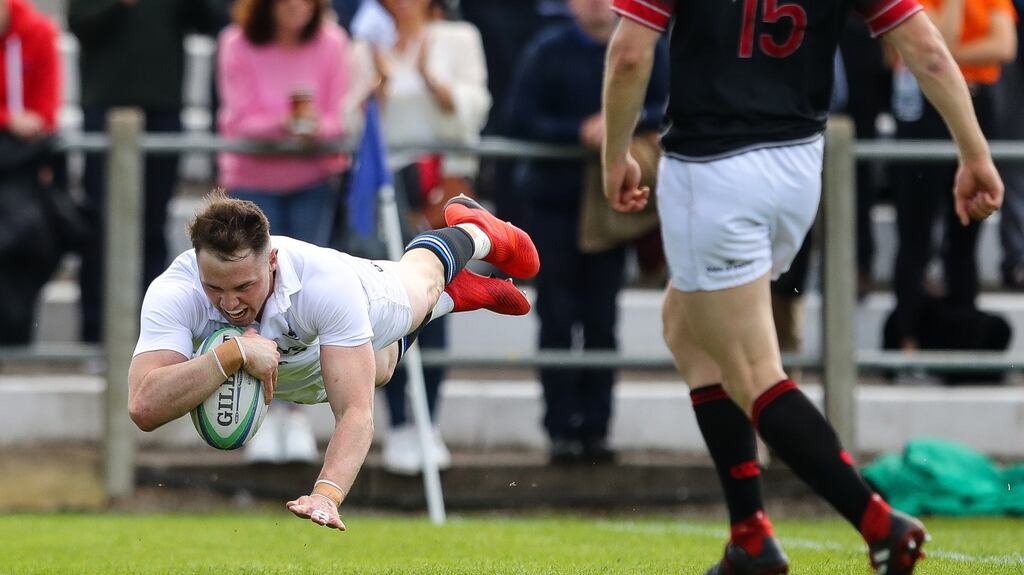 Cork Constitution’s Sean French scores the first try of the game during the AIL semi-final win over Trinity. Photo: Ryan Byrne/Inpho