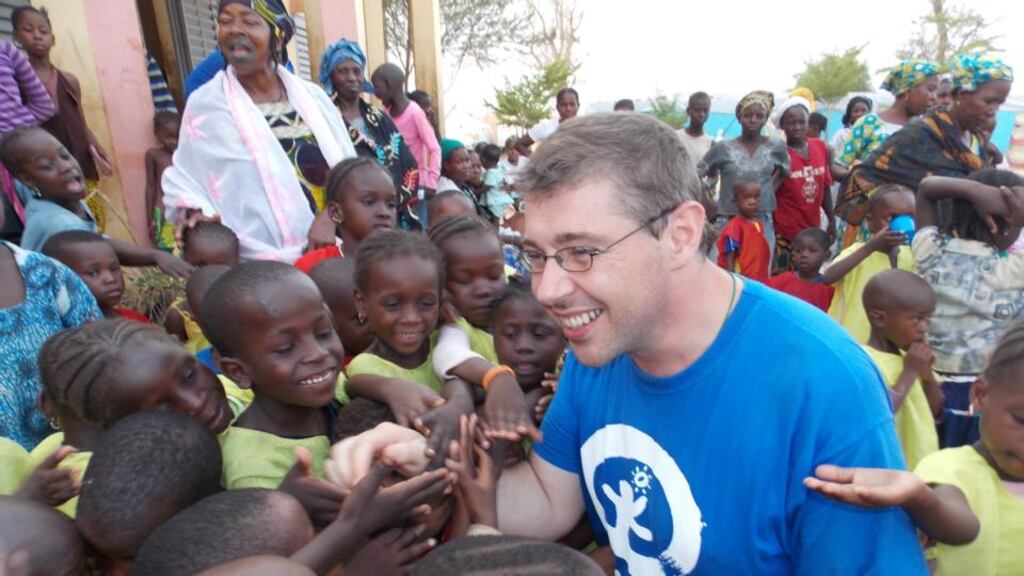 Plan Ireland’s deputy regional director for West Africa Damien Queally with children in Mali