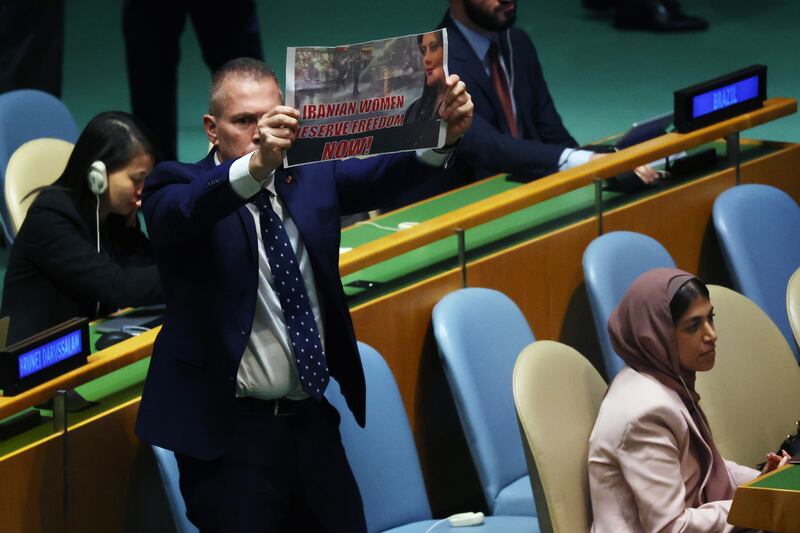 Israel’s ambassador to the UN, Gilad Erdan, holds up a sign stating 'Iranian Women Deserve Freedom Now' seconds after Iran's president, Ebrahim Raisi, began addressing world leaders during the UN general assembly on September 19th. Photograph: Spencer Platt/Getty Images