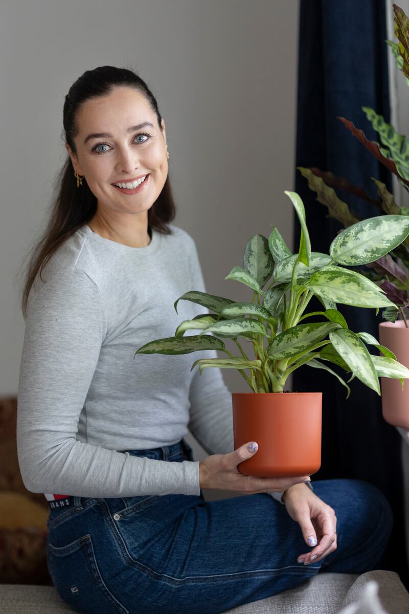 Rachel Purcell with her Aglaonema Jubilee Compacta plant at her home in Tipperary. Photograph: John D Kelly