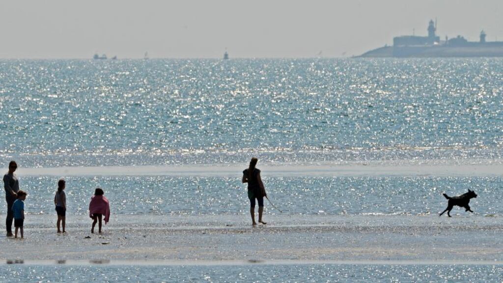Strollers on the strand at Sandymount Co Dublin . Photograph: Eric Luke / The Irish Times