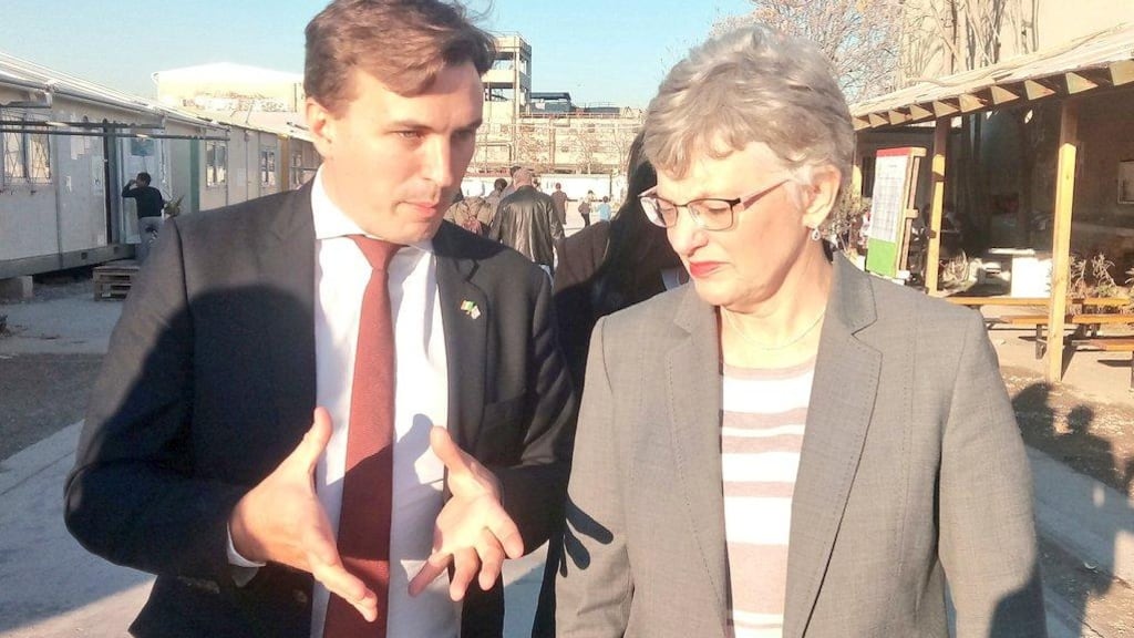 Minister for Children Katherine Zappone being guided through a migrant camp in Athens by  Luke Feeney, deputy head of mission of the Irish Embassy in Greece. Photograph: Twitter