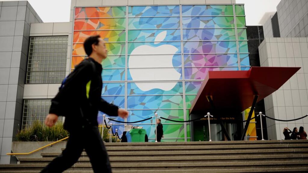 The iPhone maker is accused of collecting users’ private activity on mobile applications without their consent in breach of California law.. Photograph: Noah Berger/Bloomberg