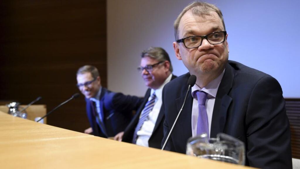 Prime minister of Finland Juha Sipilä: agreed to prioritise a revival of Finland’s stalled economy. It has been hit by Nokia’s sale of its mobile phone business to Microsoft and EU economic sanctions on neighbouring Russia. Photograph: Martti Kainulainen/Lehtikuva/AFP