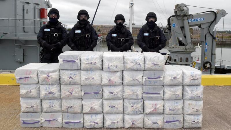 National Crime Agency officers with the recovered narcotics following the joint operation to foil the smuggling plot. Photograph: PA