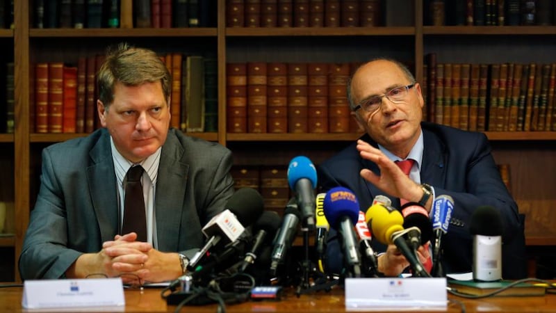Marseille’s state prosecutor Brice Robin (right) and inter-regional head of judicial police Christian Sainte (left) attend a news conference in Marseille about the arrest of suspects in the shooting of Helene Pastor. Photograph: Jean-Paul Pelissier/Reuters.