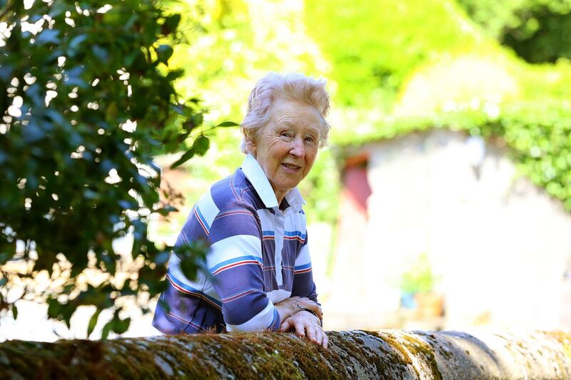 Statia O’Leary at the wall where she waited to see President Kennedy when he visited New Ross on June 27th, 1963. Photograph: Patrick Browne