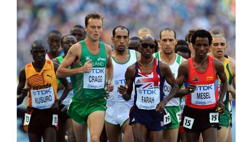 Alistair Cragg hits the front alongside Britain’s Mo Farah and Amanuel Mesel of Eritrea in the early stags of the the men's 5000 metres heats. Photograph: Stu Forster/Getty Images
