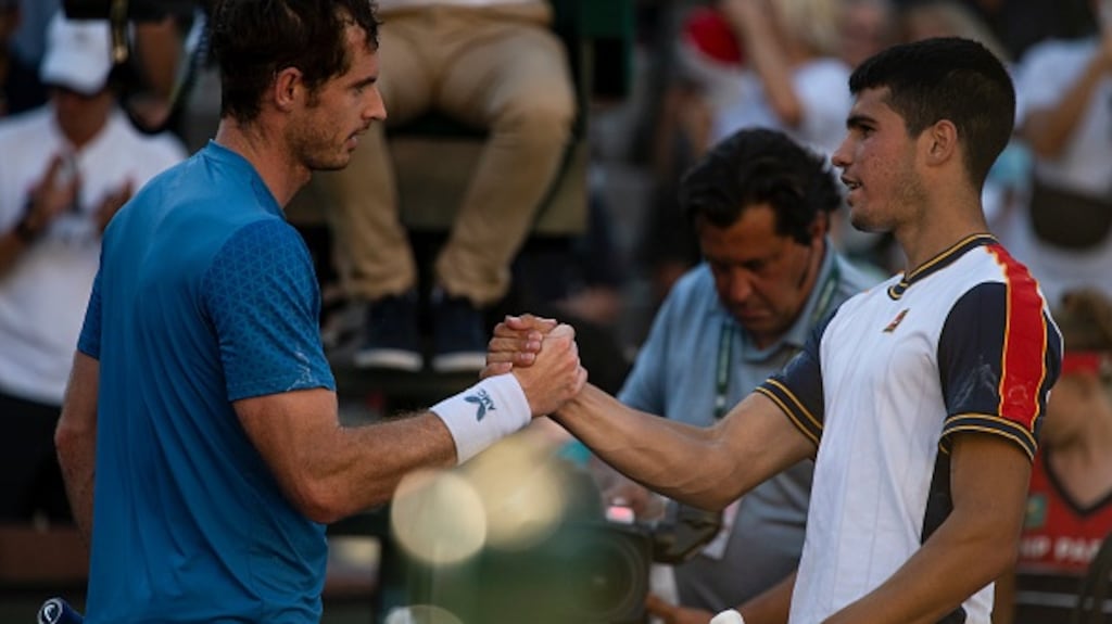 Andy Murray and Carlos Alcaraz shake hands after the Scot’s victory at the BNP Paribas Open in California. Photograph: Getty Images