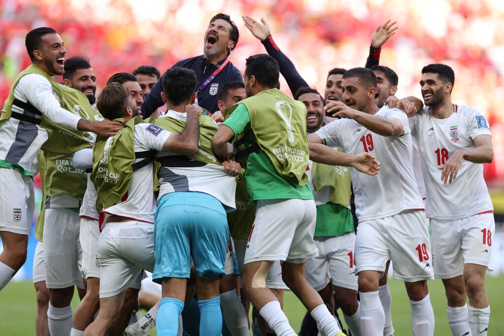 Iran celebrate the goal of Rouzbeh Cheshmi. Photograph: Fadel Senna/AFP via Getty Images