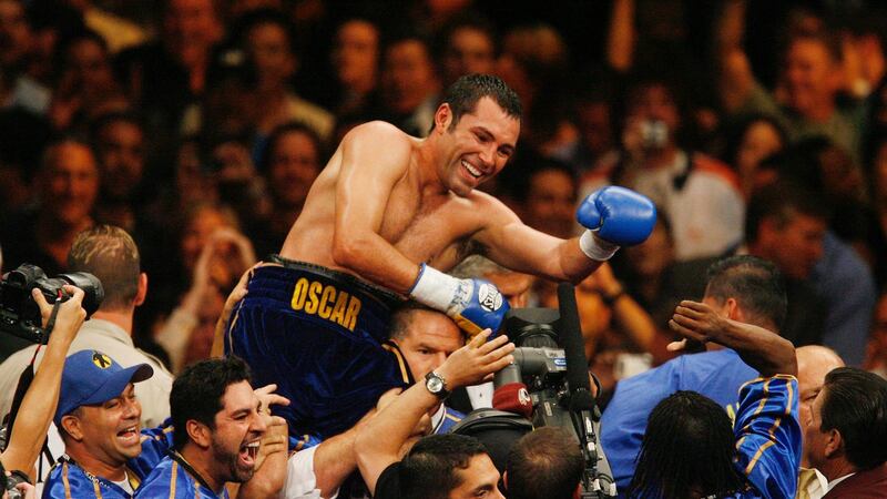 Oscar De La Hoya celebrates his sixth-round TKO of Ricardo Mayorga of Nicaragua, following their WBC super welterweight boxing title match at the MGM Grand in Las Vegas on May 6th, 2006. Photograph: Isaac Brekken/AP