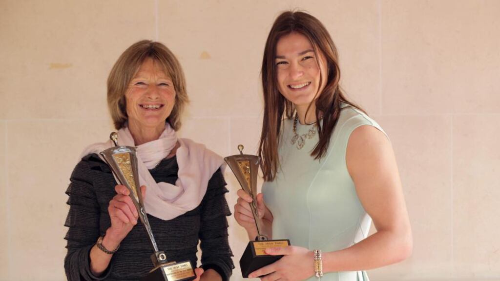 Joanna Morgan, pictured here with Katie taylor at the Irish Times Sports Woman of the Year awards, has announced her retirement from training. (Photograph: INPHO/Morgan Treacy)
