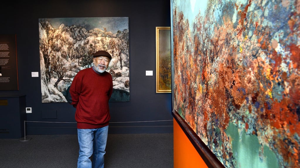 Chinese master landscape artist Hong Ling with his exhibition of Huangshan paintings at the Chester Beatty Library in Dublin. Photograph: Cyril Byrne