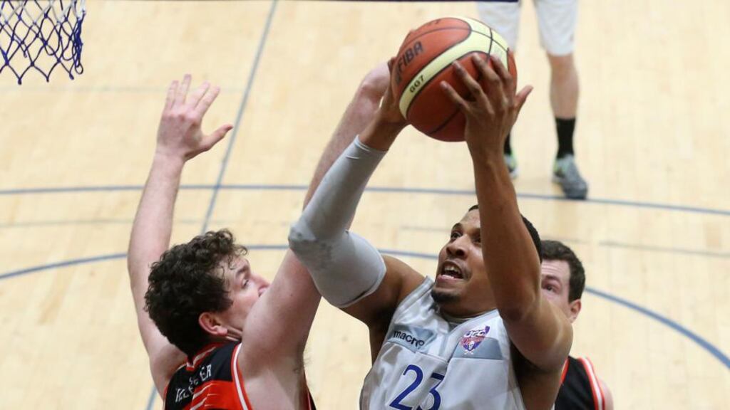 C&S UCC Demons’ Lehmon Colbert up against Kieran O’Brien of Killester in the Basketball Ireland Champions Trophy, Neptune Stadium, Cork at the weekend. Photograph: Cathal Noonan/Inpho