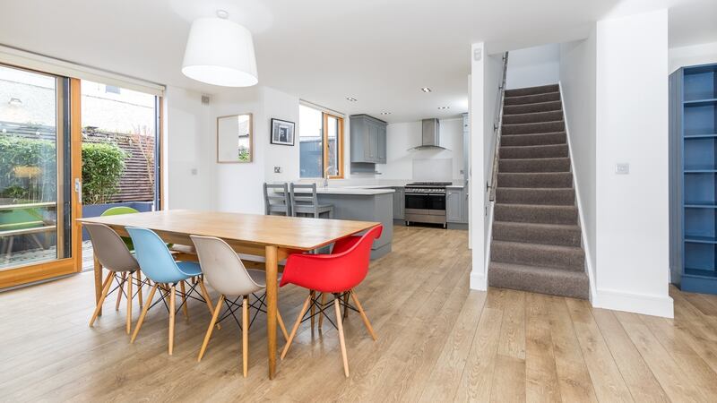 The open-plan dining area and kitchen.