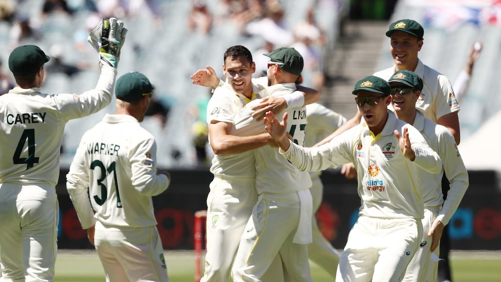 Australia’s Scott Boland celebrates the wicket of England’s Joe Root on day three of the third Ashes test at the Melbourne Cricket Ground. Photograph: Jason O’Brien/PA Wire