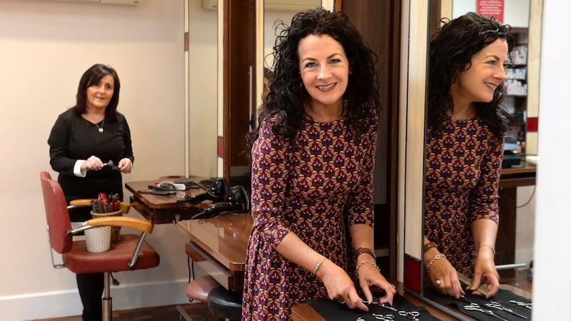Dee Gallagher and Marie O’Boyle, prepare to reopen Studio One, hair salon on William St, Tullamore. Photograph: Dara Mac Dónaill