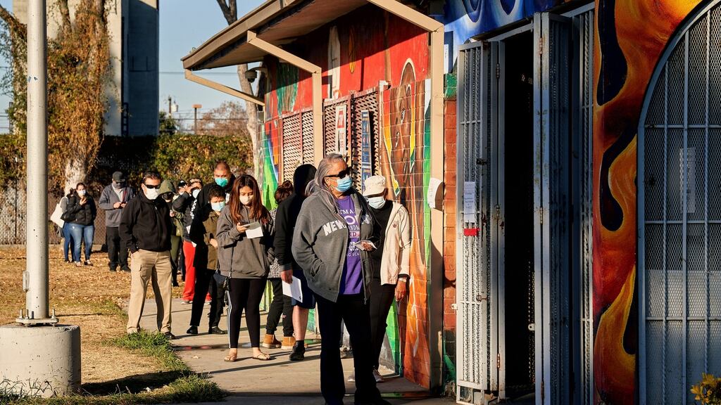 People queue at a Covid-19 testing site at Gonzales Park in Compton, California, on Sunday. Photograph: Philip Cheung/New York Times