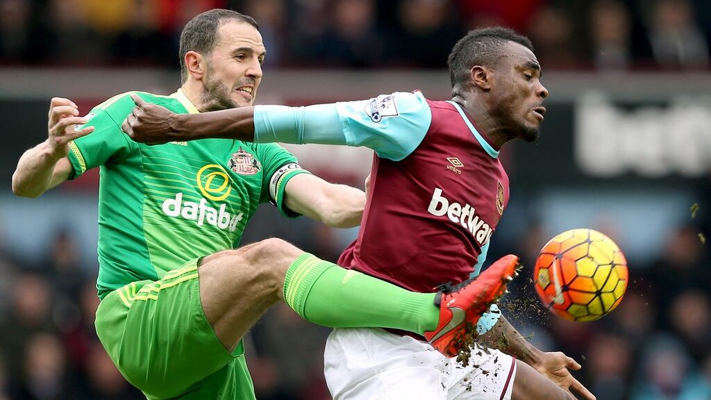Sunderland’s John O’Shea and West Ham United’s Emmanuel Emenike battle for the ball at Upton Park last weekend. Photograph: EPA
