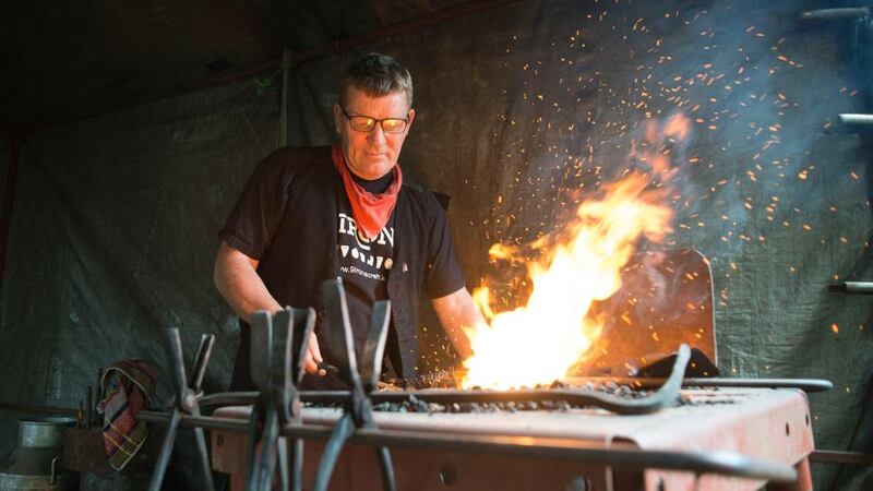 The man with the anvil: blacksmith Patrick Strahan  at Electric Picnic’s GreenCrafts Village. Photograph: Dave Meehan