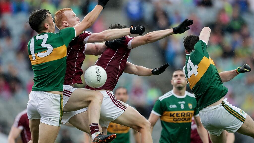 Kerry’s David Clifford and Paul Geaney with Declan Kyne and Johnny Heaney of Galway all contesting a high ball. Photpgraph: Laszlo Geczo/Inpho