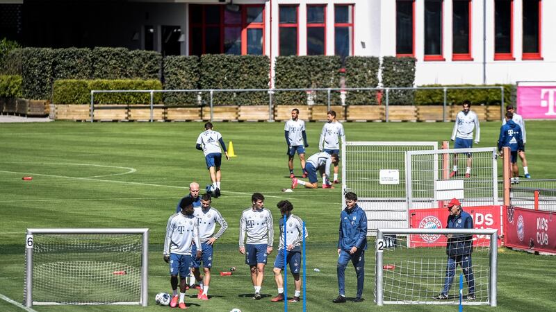 Bayern Munich players train on Wednesday. The Bundesliga can restart in the second half of May following the coronavirus stoppage, Chancellor Angela Merkel said on Wednesday. Photograph: Lukas Barth-Tuttas/EPA