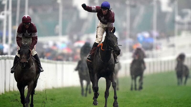 Delta Work ridden by Jack Kennedy (centre) passes Tiger Roll ridden by Davy Russell (left) to win the Glenfarclas Chase. Photograph: Tim Goode/PA Wire
