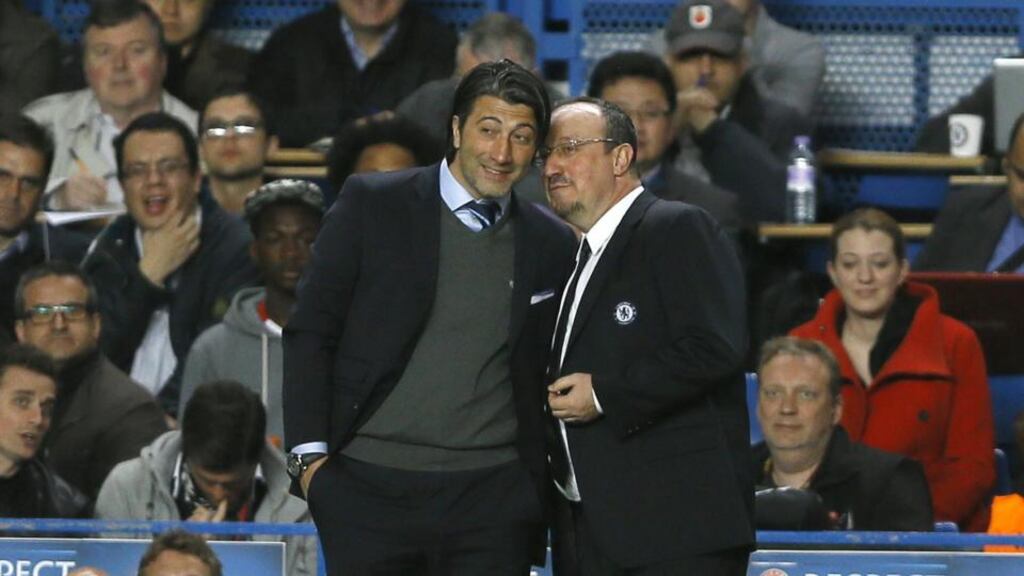 Chelsea’s interim manager Rafael Benitez talks to Basel’s coach Murat Yakin