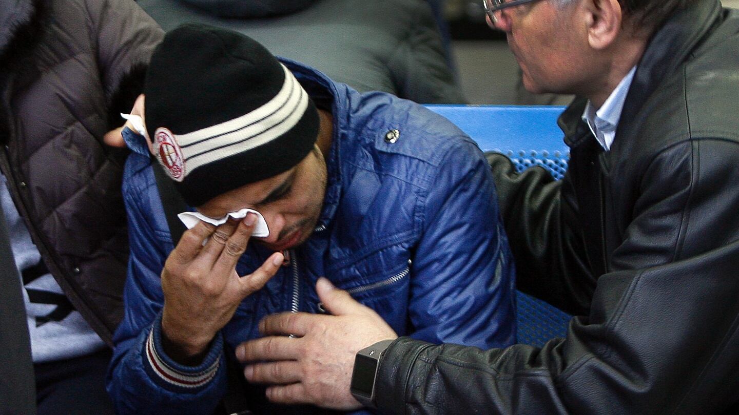 Relatives of the victims of the airplane crash mourn at the airport in Rostov-on-Don on Saturday. All sixty-two people on board a Flydubai Boeing 737 were killed when the plane crashed and burst into flames as it was landing in Rostov-on-Don, in Southern Russia. Photograph: Getty