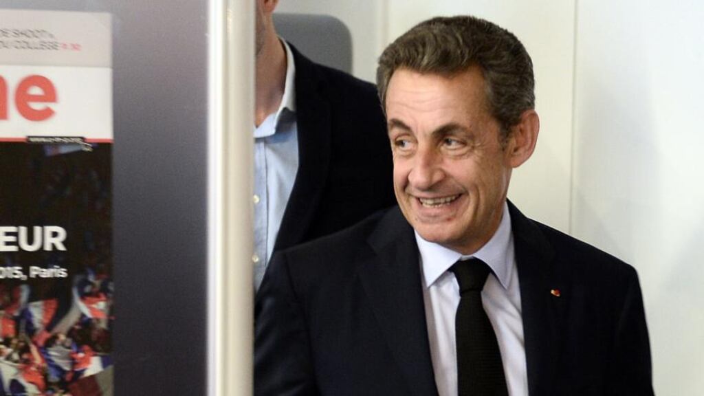 Nicolas Sarkozy arrives at UMP party headquarters in Paris. The 212,000 members of the party will vote on the party’s statute and new name. Photograph: Stephane de Sakutin/Afp/Getty Images