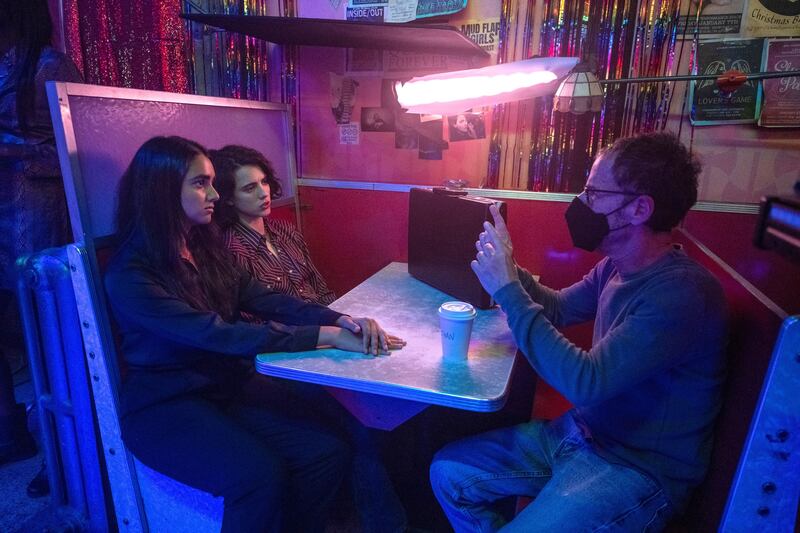 Drive-Away Dolls: Geraldine Viswanathan and Margaret Qualley with director Ethan Coen. Photograph: Wilson Webb/Working Title/Focus Features