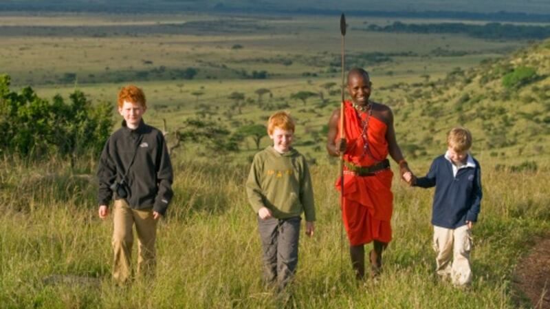 Children with Massai guide, Laikipia, Kenya