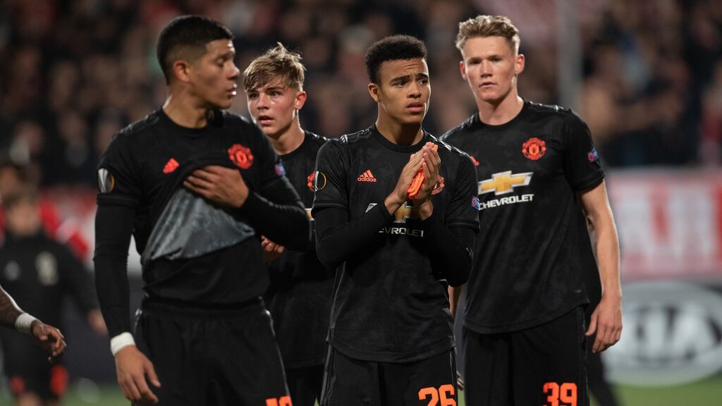 Manchester United’s Mason Greenwood and team-mates applaud the fans after the Europa League 0-0 draw with AZ Alkmaar. Photo: Joe Giddens/PA Wire