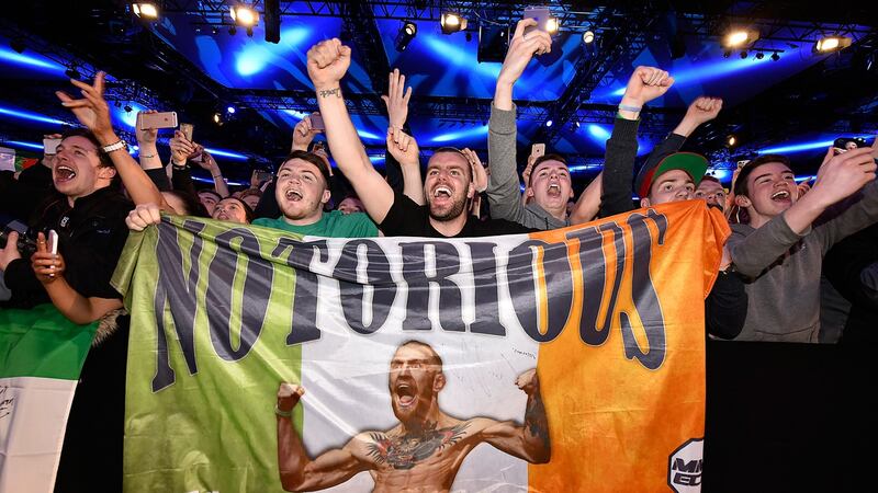 Fans of Conor McGregor get behind their man. Photograph: Getty Images