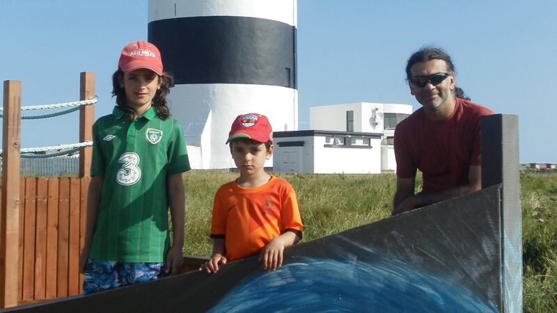 Eoghan and Ruairí with their father Sanjeev Chada. Photograph: Family handout/Garda/PA Wire