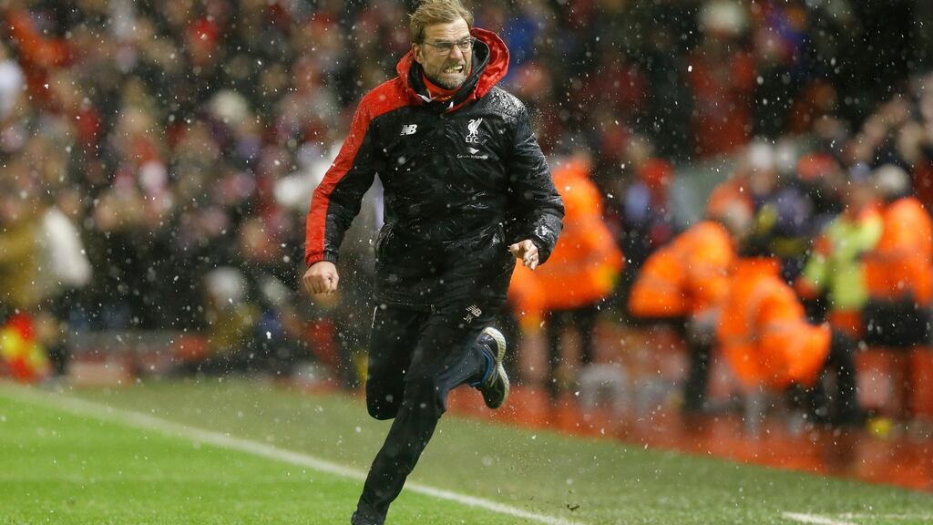 Liverpool manager Jürgen Klopp celebrates after Joe Allen scores the late equaliser in the Premier League game at Anfield. Photograph: Carl Recine/Action Images via Reuters/Livepic