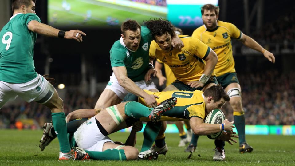Australia’s Bernard Foley scores their second try of the game. Photograph: Ryan Byrne / Inpho