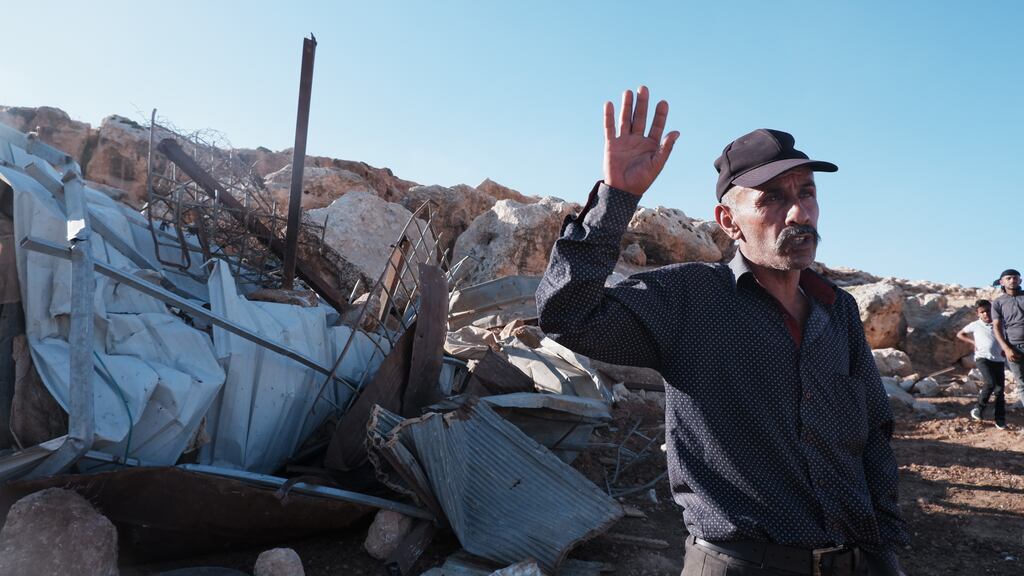 Khader Salamah next to a demolished structure in Ein Samiya, Area C. Photograph: Jade Wilson