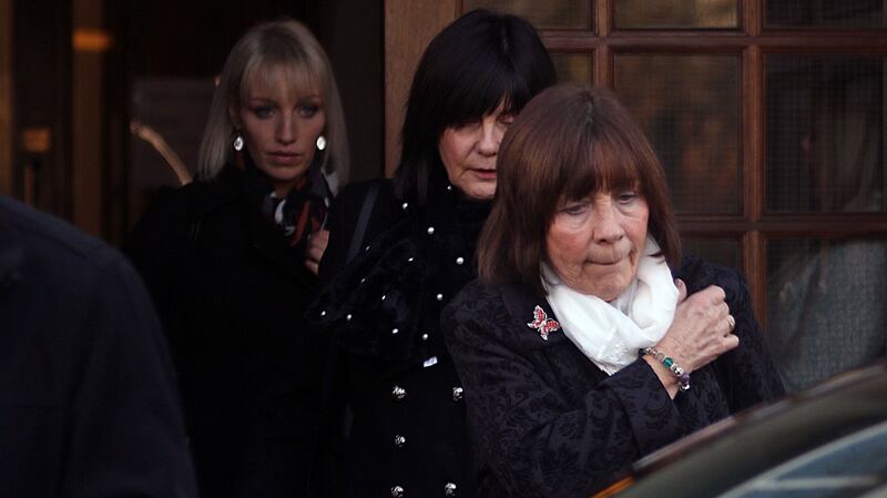 The visibly distressed mother of Clodagh Hawe, Mary Coll (front) Aunt Carmel (middle) and sister Jacqueline Connolly leave the inquest into the deaths of the Hawe family at Cavan Courthouse on Monday afternoon. Photo: Lorraine Teevan