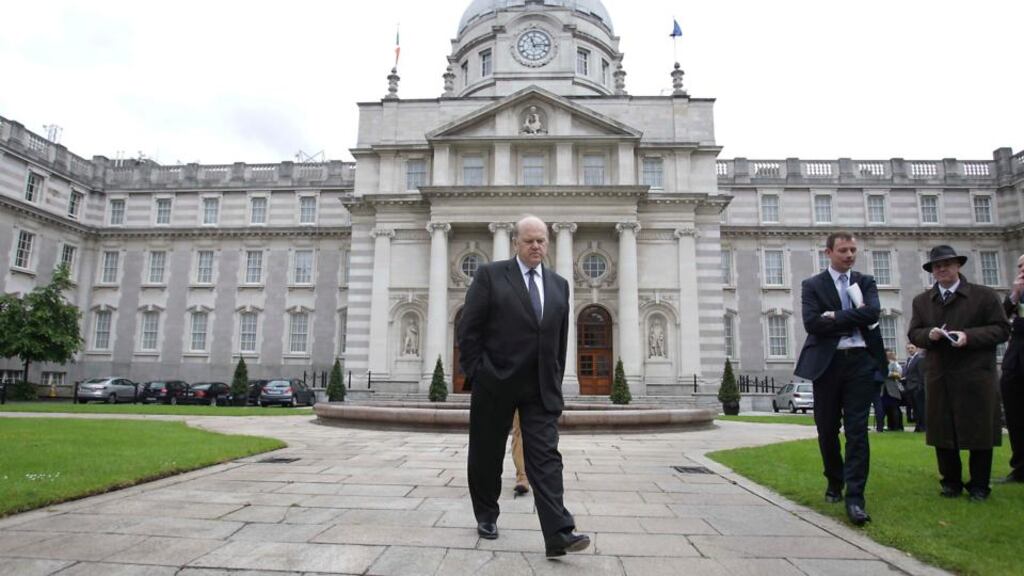 Minister for Finance Michael Noonan: has begun signalling that the planned €2 billion adjustment to achieve next year’s deficit target may not now be necessary. Photograph: Stephen Collins/Collins Photos