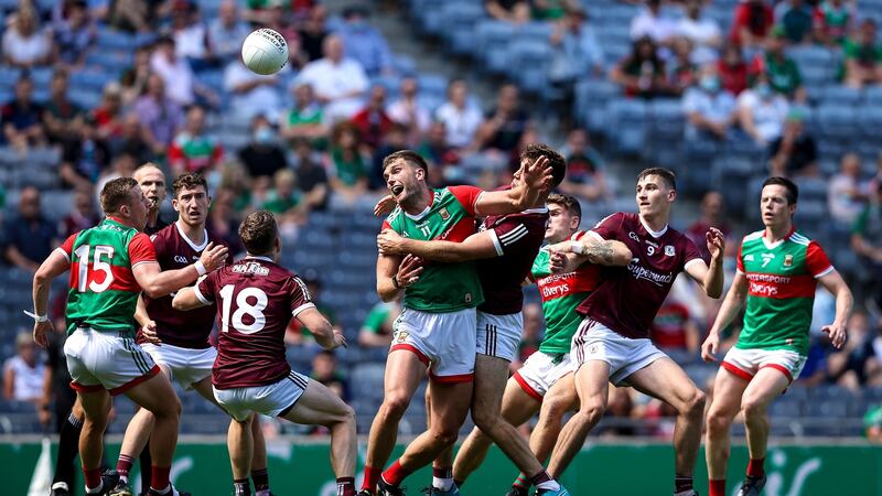 Mayo’s Aidan O’Shea in action against Paul Conroy of Galway during the Connacht SFC Final at Croke Park. Photograph: Tommy Dickson/Inpho