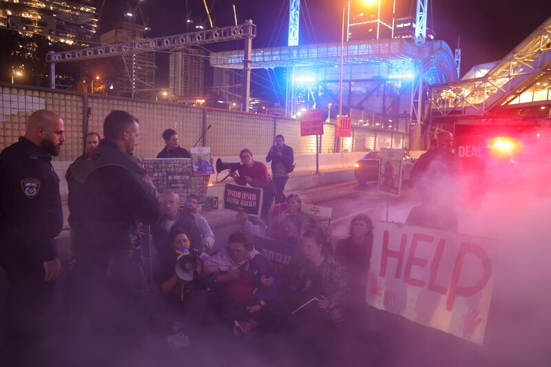 Israeli police disperse supporters and families of hostages held in Gaza by Hamas after they blocked a main road during a protest in Tel Aviv, Israel. Photograph: EPA