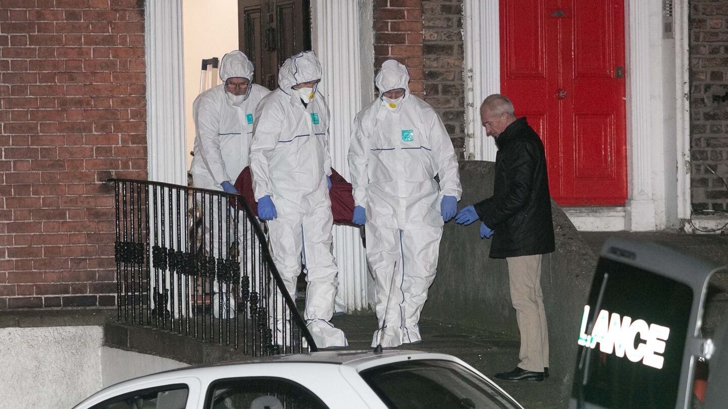 The body of Joanne Lee is removed from the house in Ranelagh where she was found dead. Photograph Gareth Chaney/Collins
