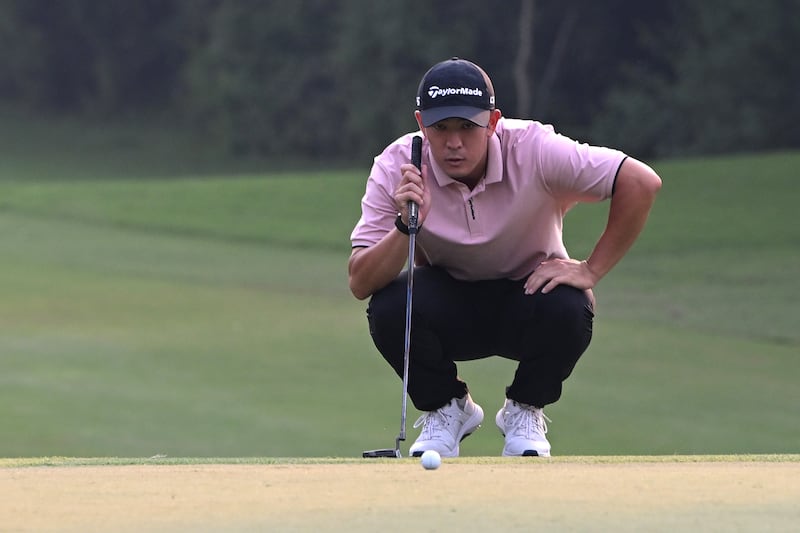 Japan's Keita Nakajima lines up a putt on the 18th green during the third round of the DP World India Championship at Delhi Golf Club. Photograph: Prakash Singh/Getty Images