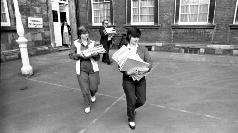 Joanne Hayes and her sister Kathleen leaving the tribunal with their solicitor Patrick Mann in 1985. Photograph: Matt Kavanagh