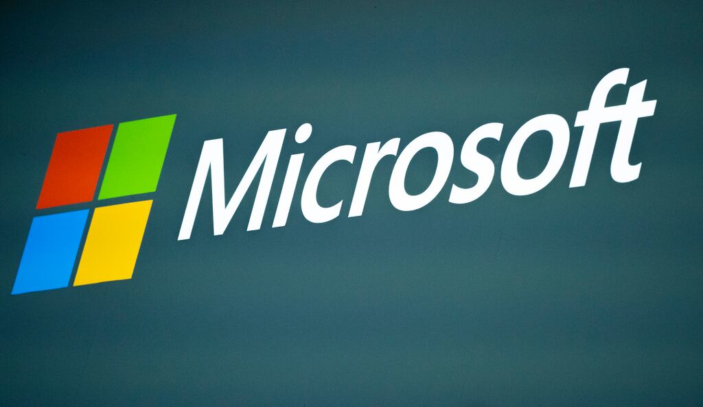 Microsoft shares dropped slightly in aftermarket trading. Photograph: AP