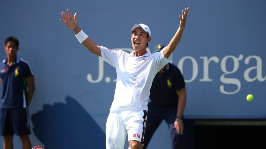 Kei Nishikori celebrates his US Open win over Novak Djokovic. Photograph: Chang W LeeThe New York Times