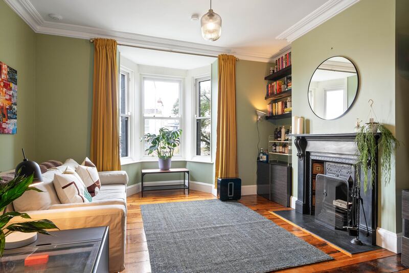 The front livingroom has a fine bay window